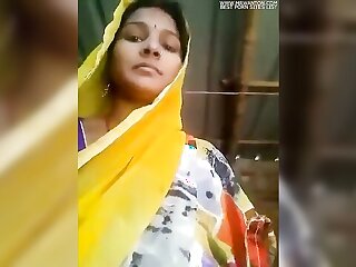 Indian housewife fondles her own breasts in arousing video