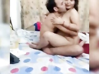 Indian wife gives oral pleasure to a man while her husband watches